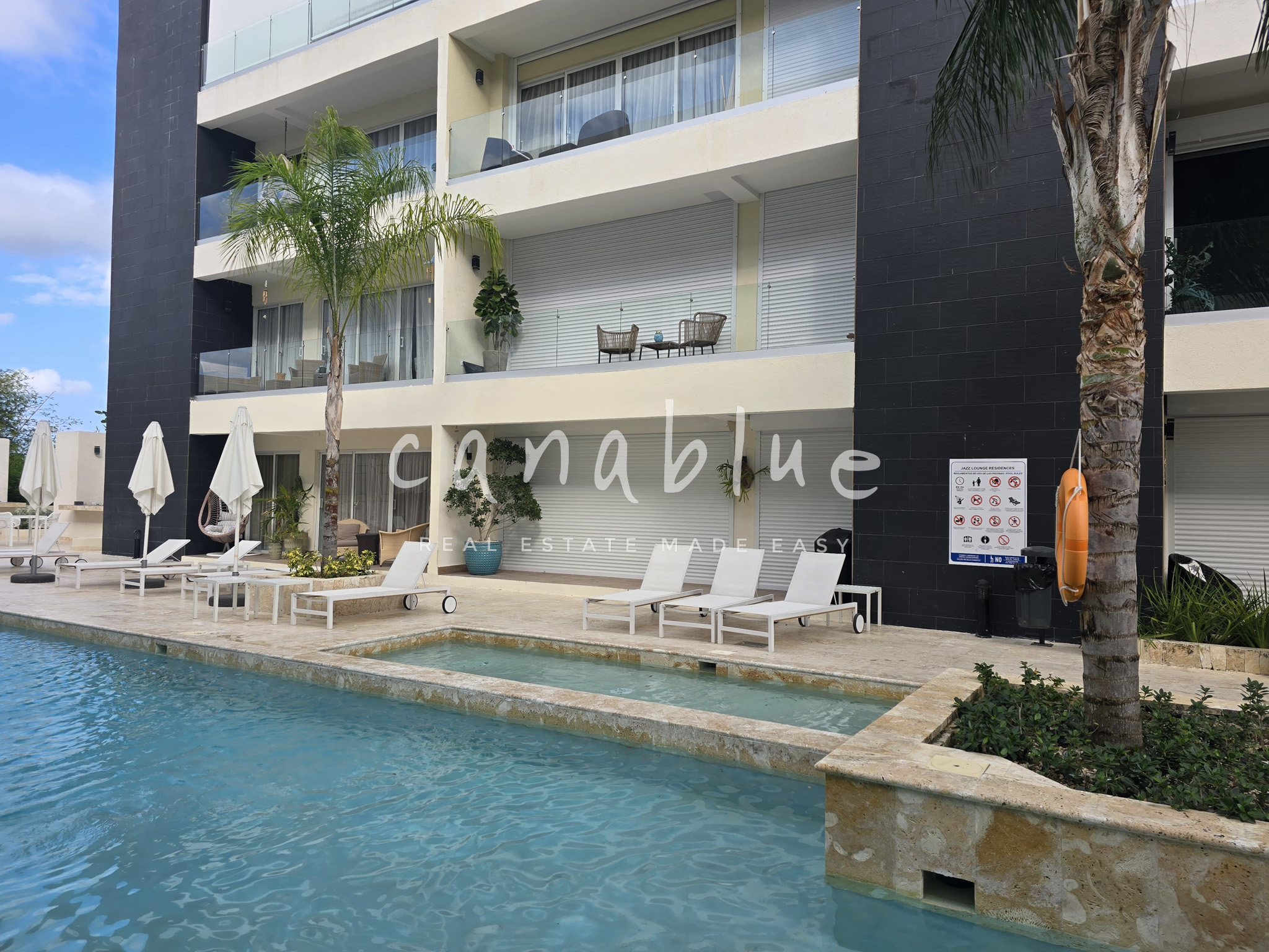 Poolfront Living Condo at Las Canas