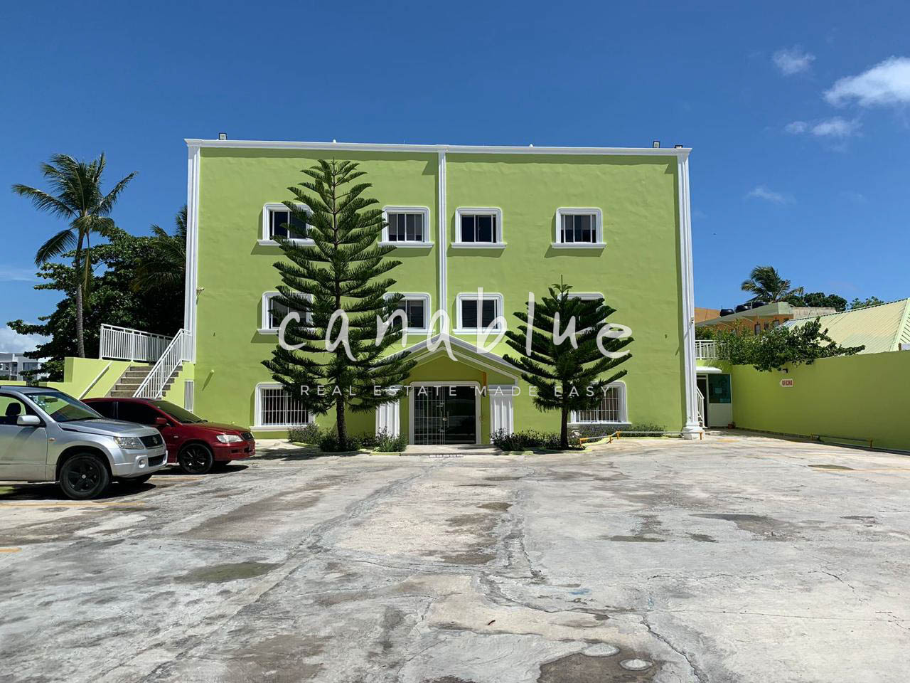 Turnkey 20-Unit Apartment Building with Commercial Plaza