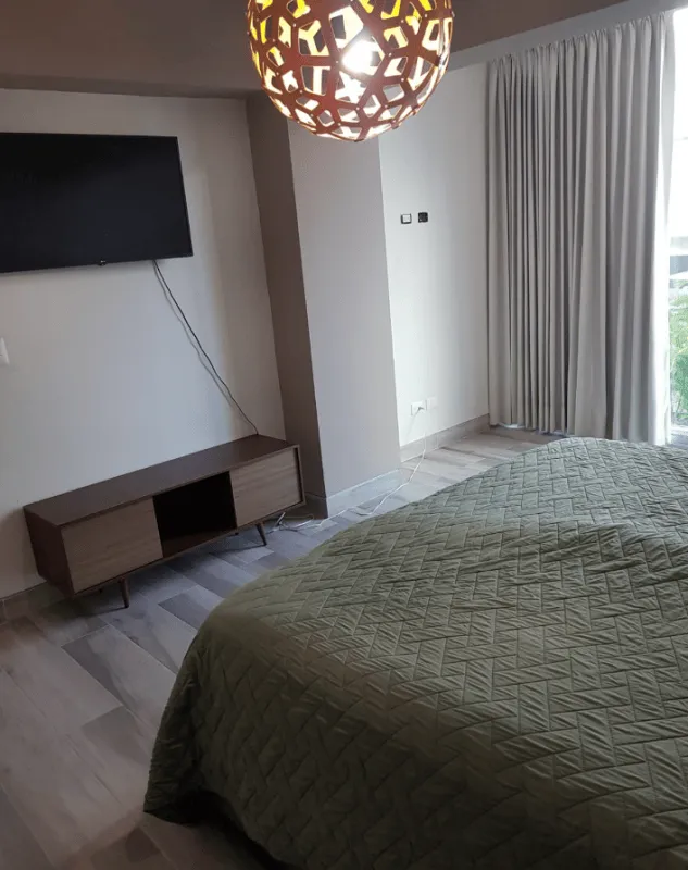 Punta Cana Village modern two-bedroom condo for sale is approximately a five-minute drive from the beach — photo 11