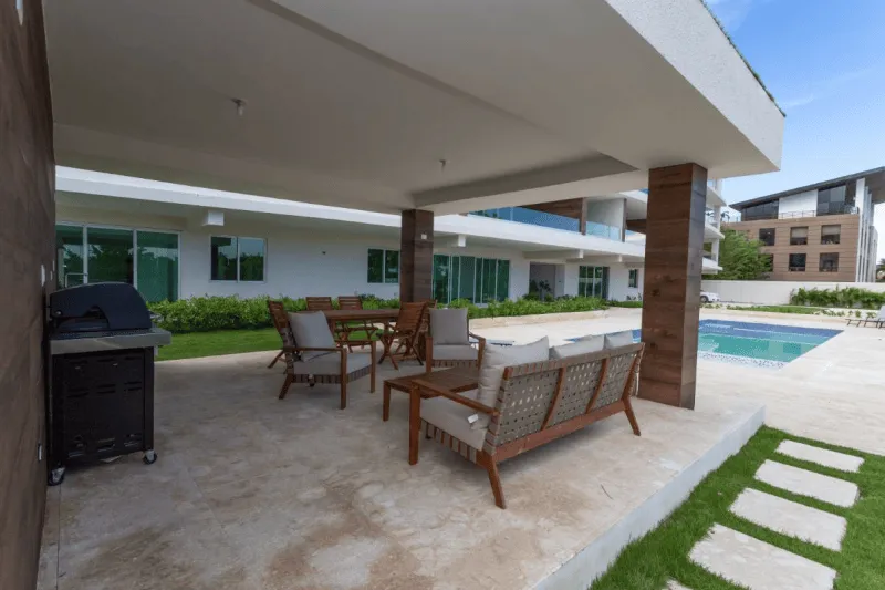 Punta Cana Village modern two-bedroom condo for sale is approximately a five-minute drive from the beach — photo 5