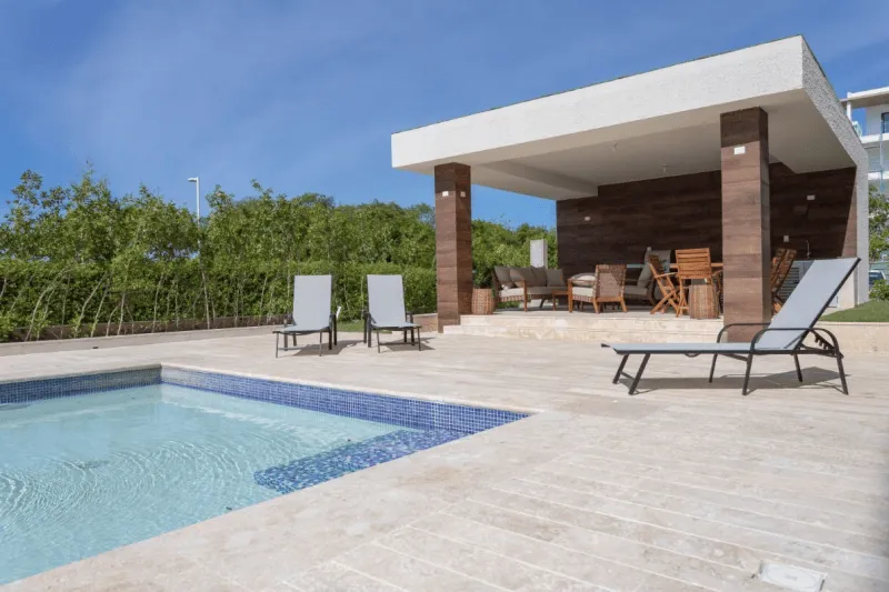 Punta Cana Village modern two-bedroom condo for sale is approximately a five-minute drive from the beach — photo 6
